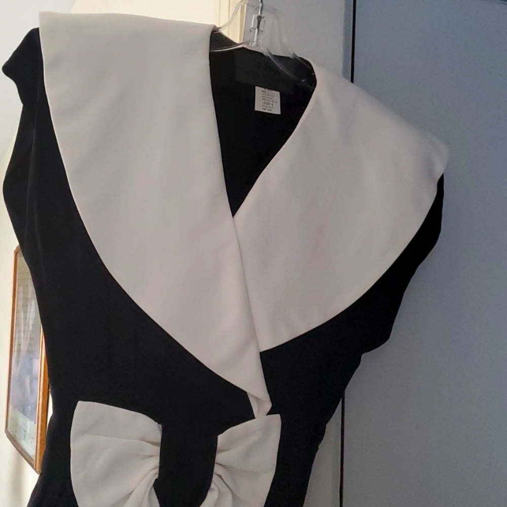 Black dress with white collar and bow